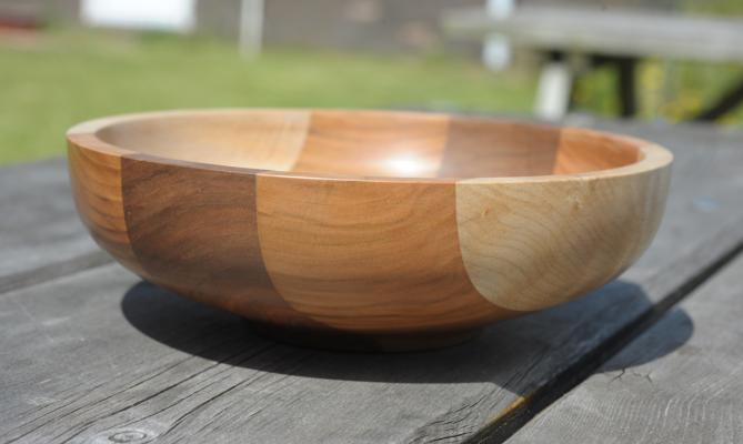 Round Britain Bowl. 19 cm diameter and 6 cm high using well seasoned timbers, the components are jointed using traditional cabinet makers' techniques with hand tools. The glue is waterproof and the finish is food safe oil and waxes,